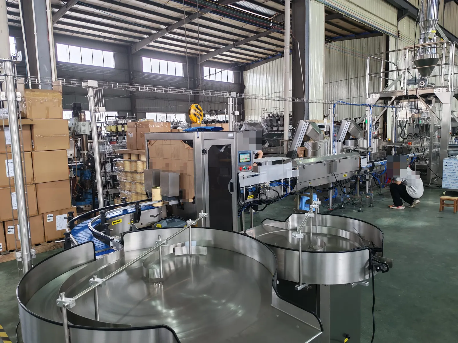 Workshop and conveyor equipment; branding anonymised.